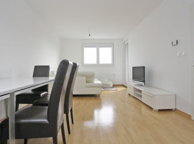 New, unused, furnished, 2-bedroom apt (70m2) with a balcony and a garage